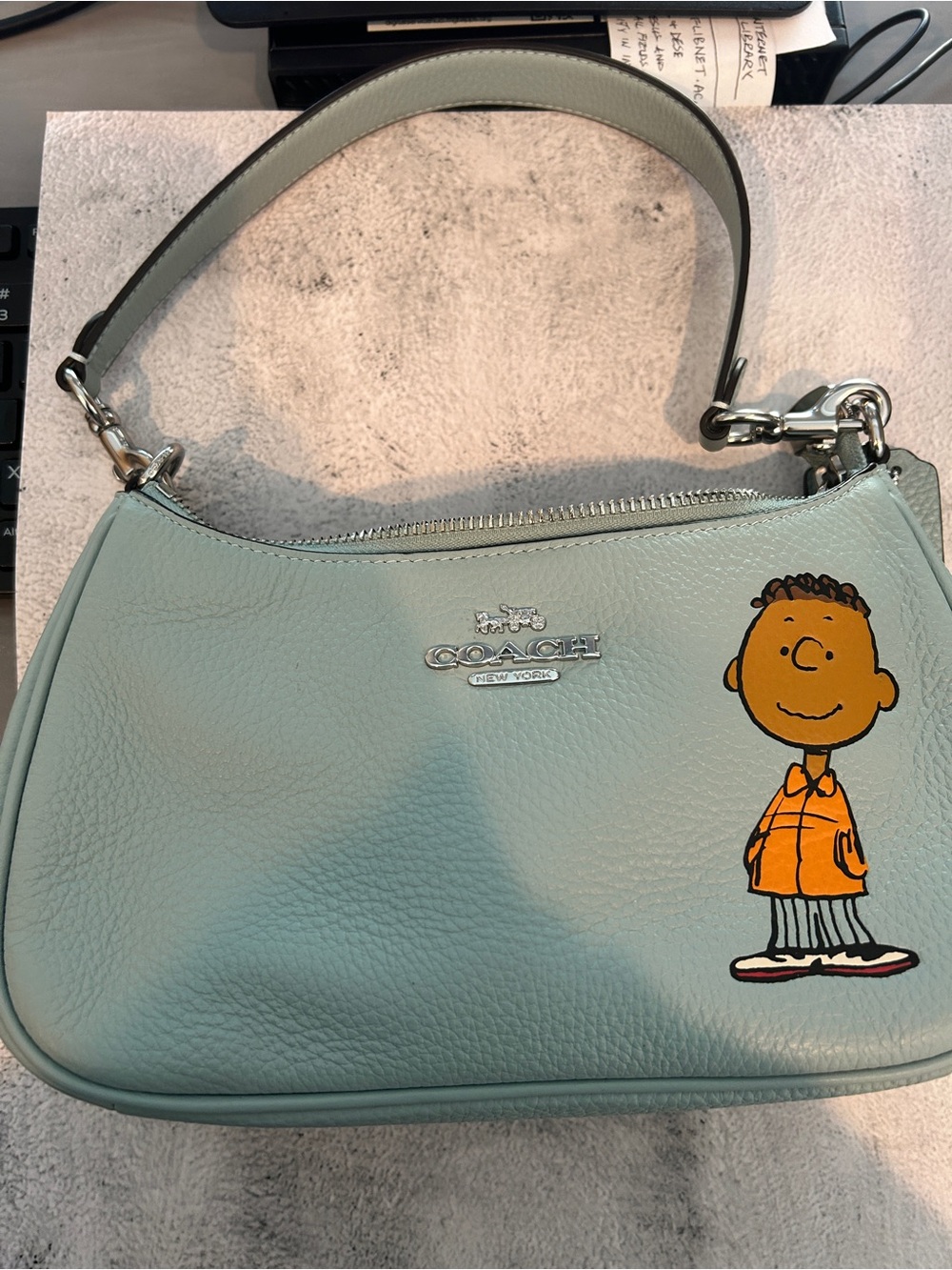 COACH Light Blue Pebbled Leather Shoulder Bag with Cartoon Graphic